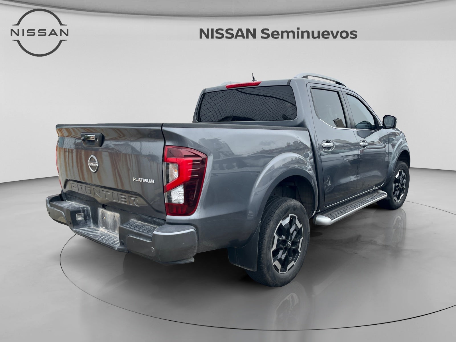 2023 Nissan FRONTIER PLATINUM LE TA 23